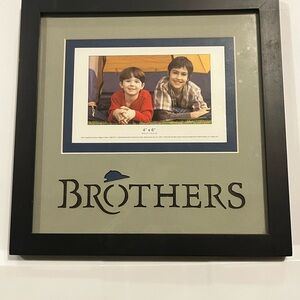 Black Accent Picture Frame Featuring Bold Typography